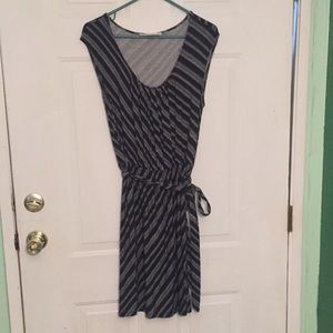Black and white dress tie at waist